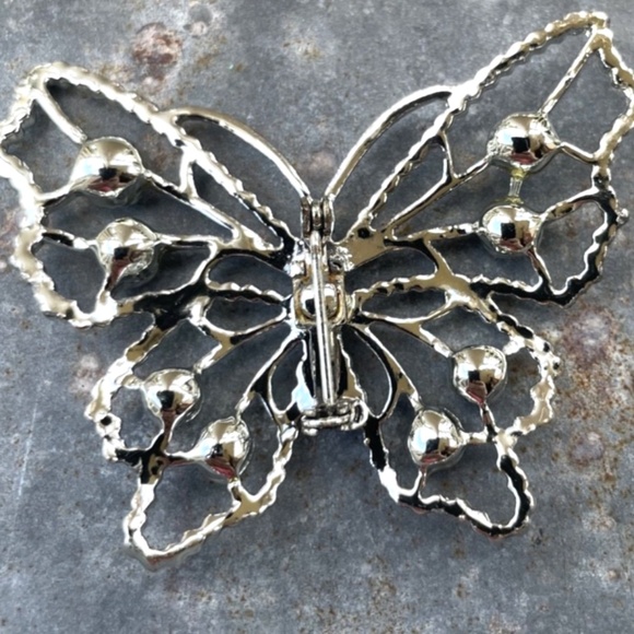 Vintage silver tone airy Butterfly Brooch w/ blue rhinestones - Picture 2 of 2